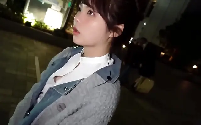 From behind the perfect curves of a young Japanese babe in heat
