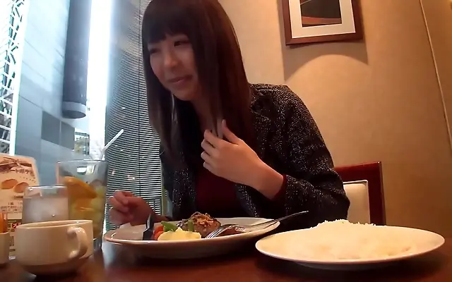 On the bed with a sexy Japanese babe who can't keep her hands off you