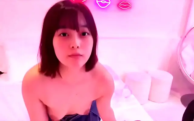 Naughty Japanese College Babe Explores Pleasure in Private