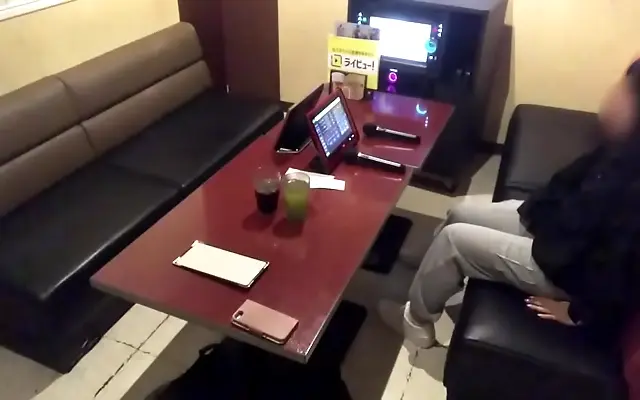 Lace trim peeking as a shy Japanese teen belts out moans in private karaoke